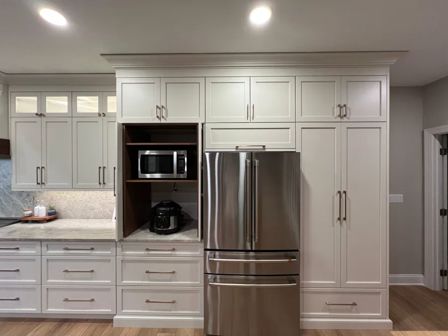 Finished kitchen cabinetry with clean cabinet layout and countertop detail