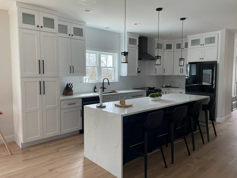 Kitchen cabinet project with white cabinetry and bright countertop finishes